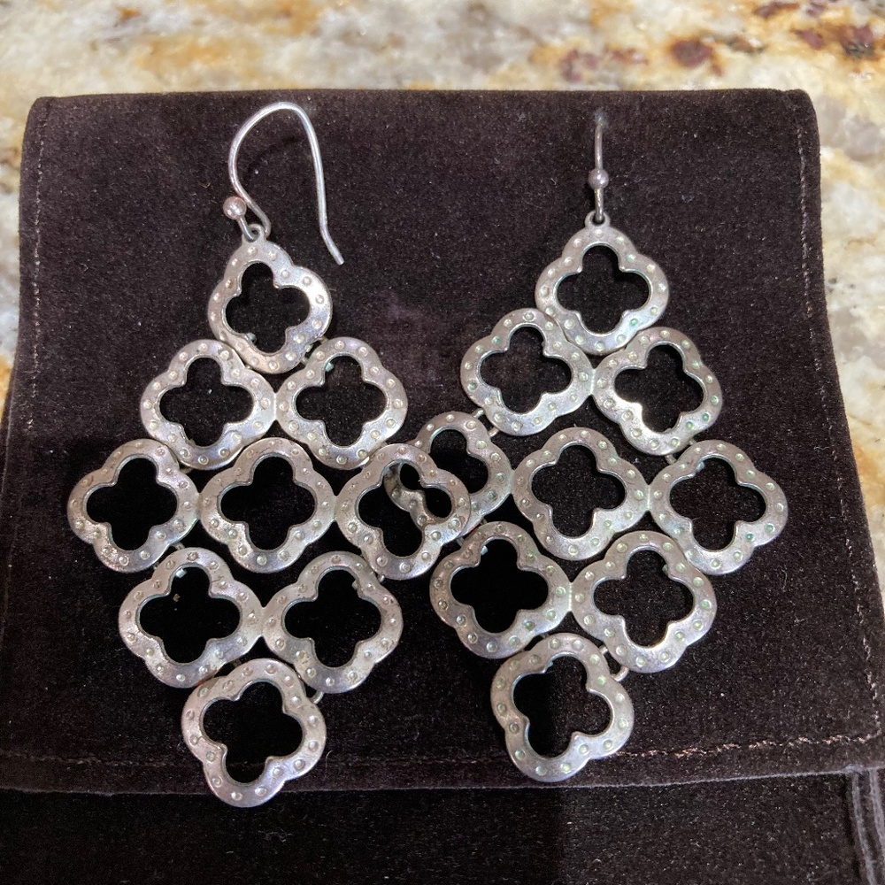 silver metal earrings